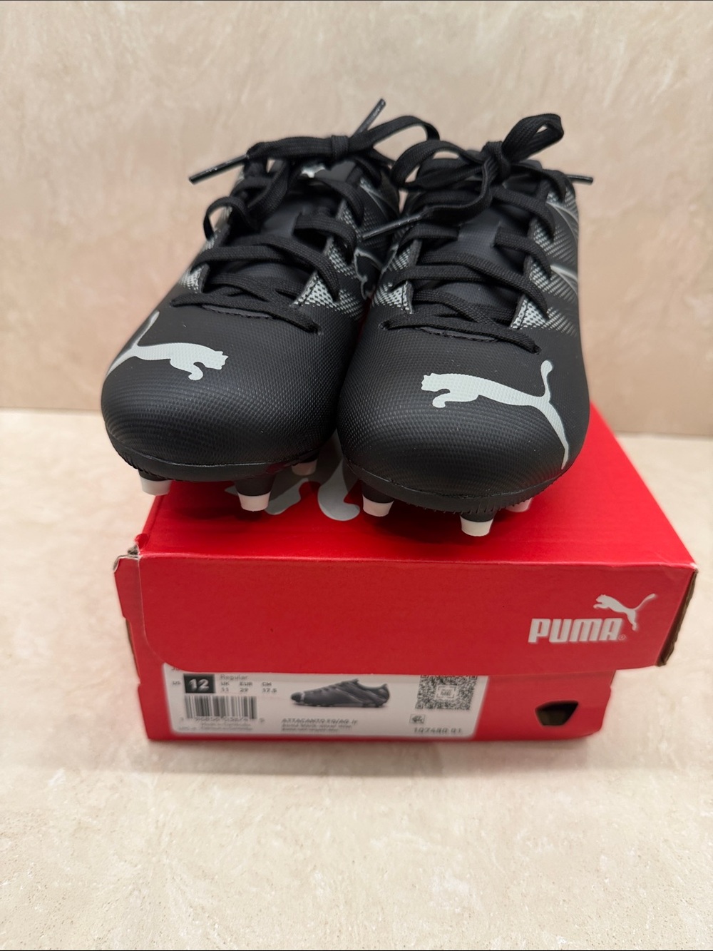 Puma Kids Black Soccer Cleats with White Logo